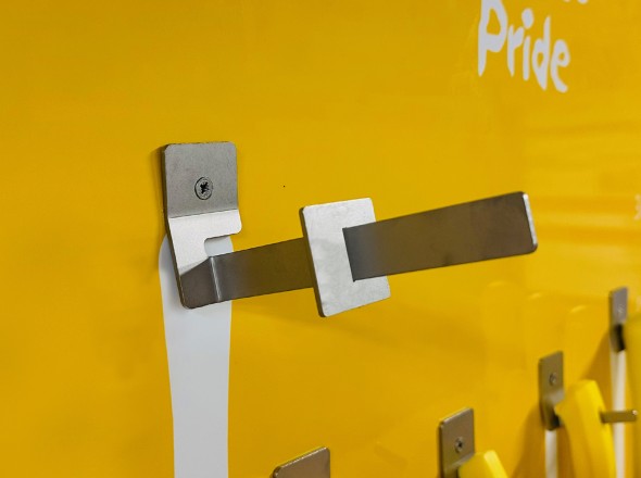 Stainless steel storage hook with stop on shadowboard
